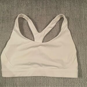 Athleta workout bra. Like new, worn once.  Crisp white photo not accurate